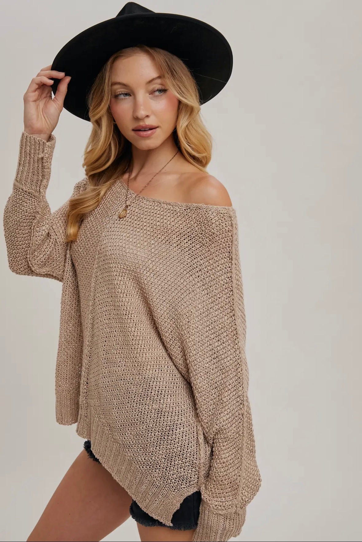 Reverse seam loose fit sweater