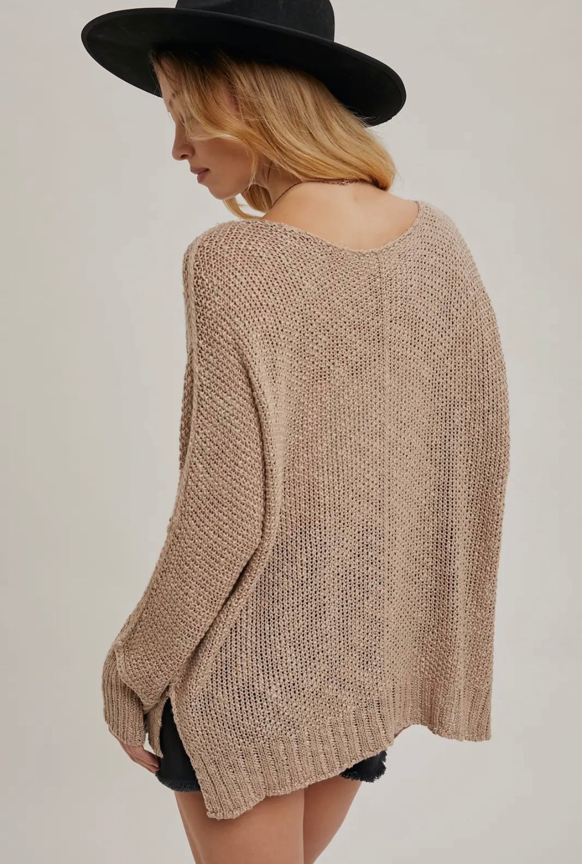 Reverse seam loose fit sweater